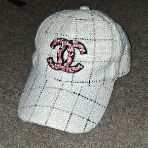 CHANEL White Tweed Cap with Pink Emblem And Adjustable Strap